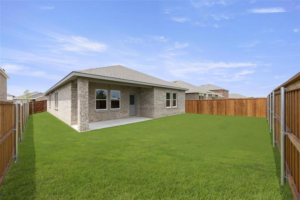 1852 McCree Street Forney, TX 75126 - Photo 18 of 21 a house view with a garden space