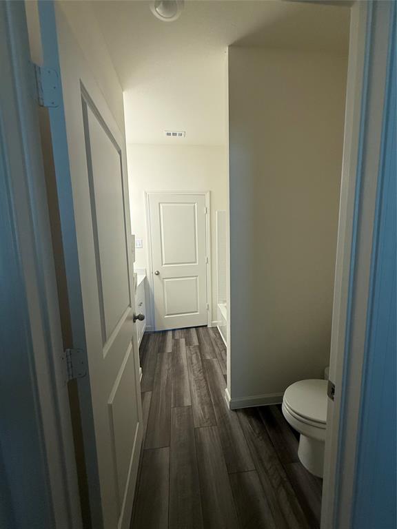 1852 McCree Street Forney, TX 75126 - Photo 8 of 21 a bathroom with a sink and a toilet