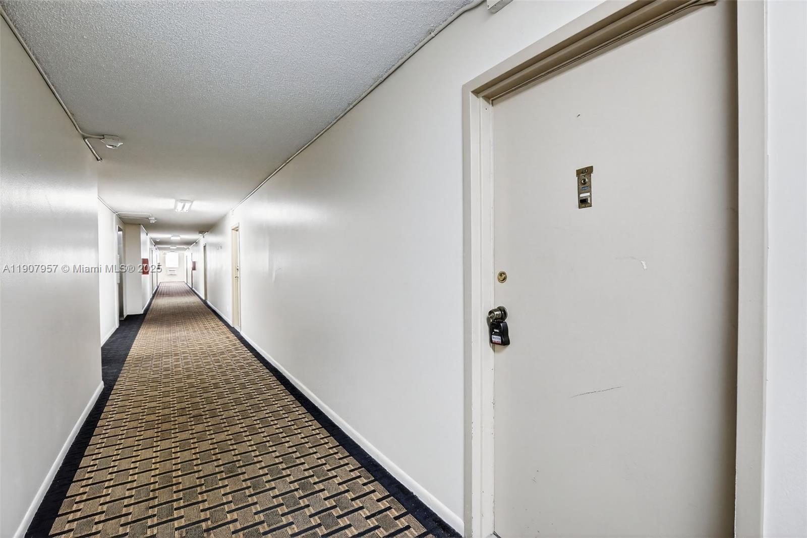 6500 Cypress Road, Unit 410 Plantation, FL 33317 - Photo 20 of 33 a view of a hallway