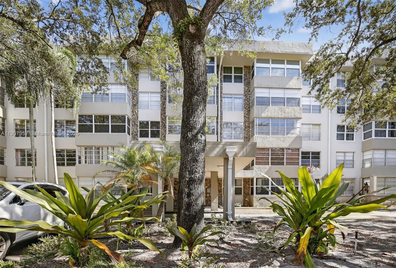 6500 Cypress Road, Unit 410 Plantation, FL 33317 - Photo 28 of 33 a view of a building with a tree