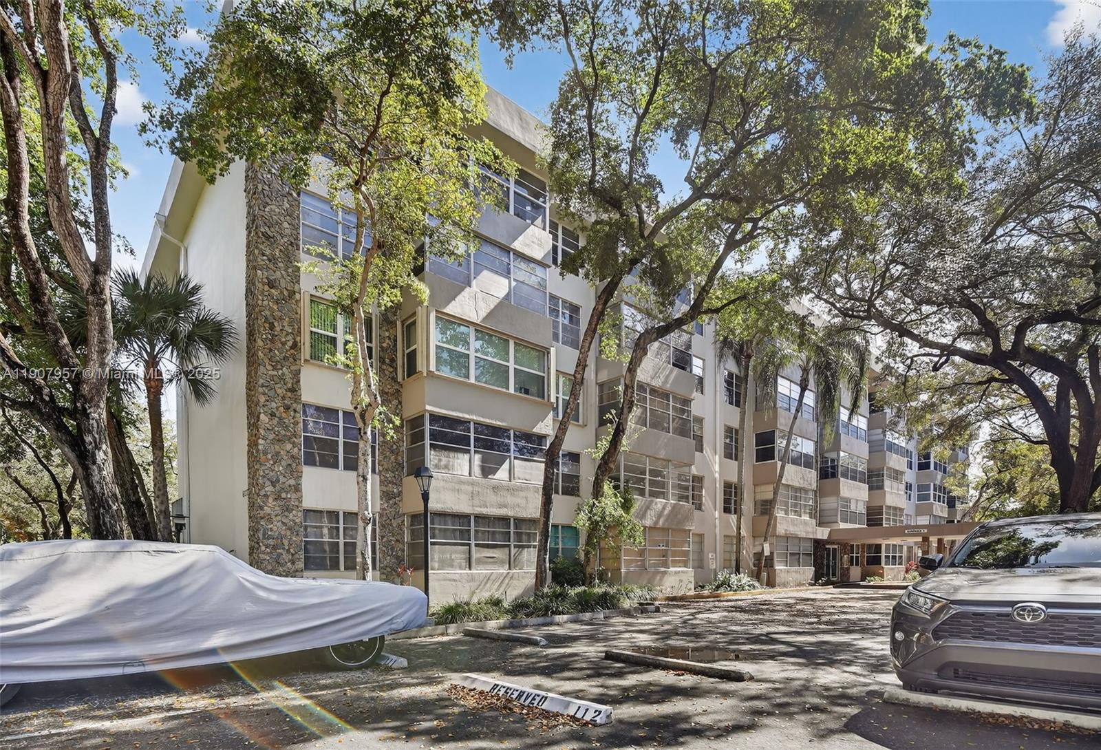 6500 Cypress Road, Unit 410 Plantation, FL 33317 - Photo 33 of 33 a view of a street with of cars parked on the road