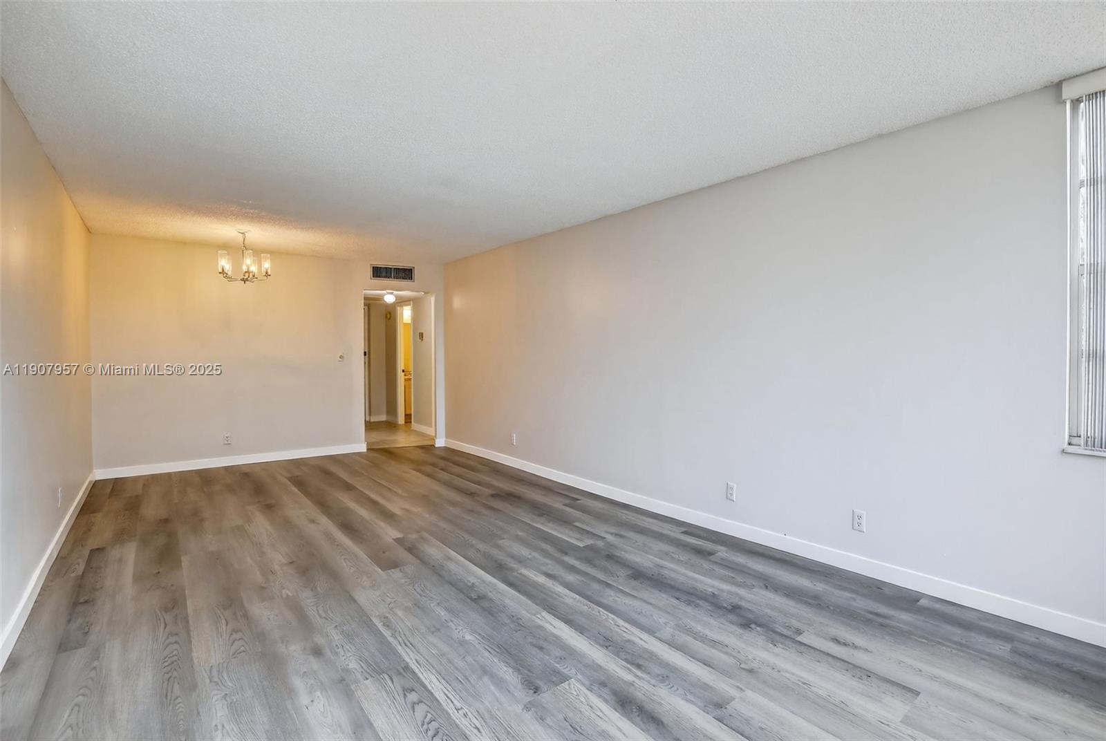 6500 Cypress Road, Unit 410 Plantation, FL 33317 - Photo 10 of 33 a view of an empty room and window