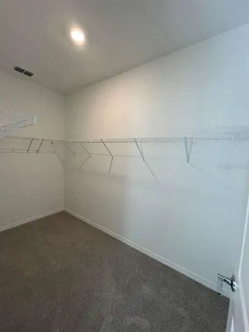 an empty room with an entryway