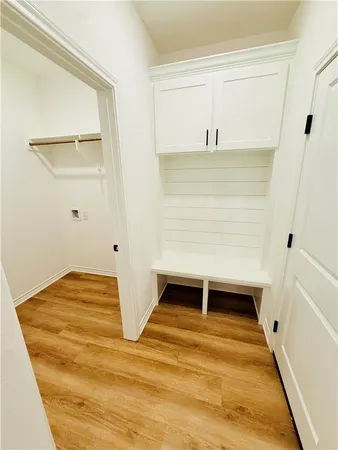 a view of a pathway with a yard