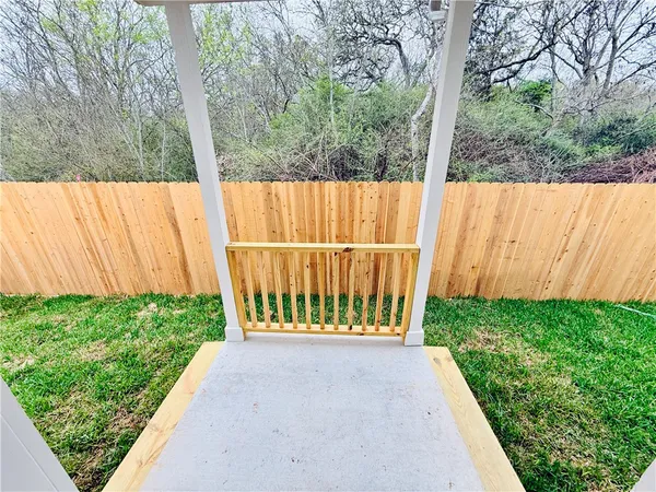 a view of a backyard with a garden