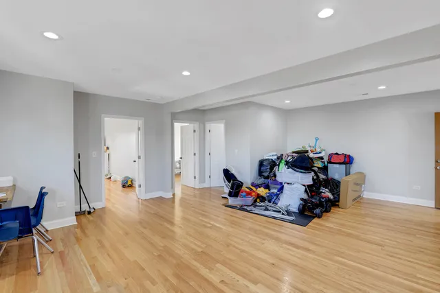 a room with furniture and a wooden floor