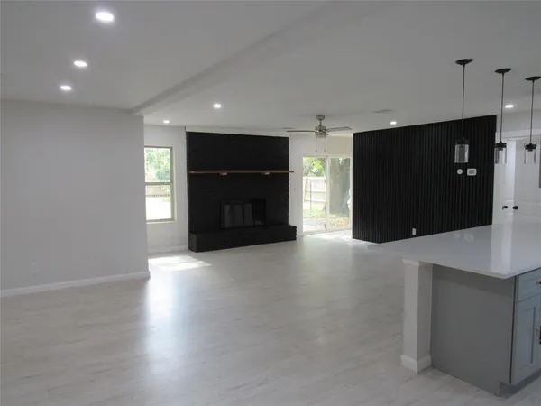 a view of a livingroom with a flat screen tv