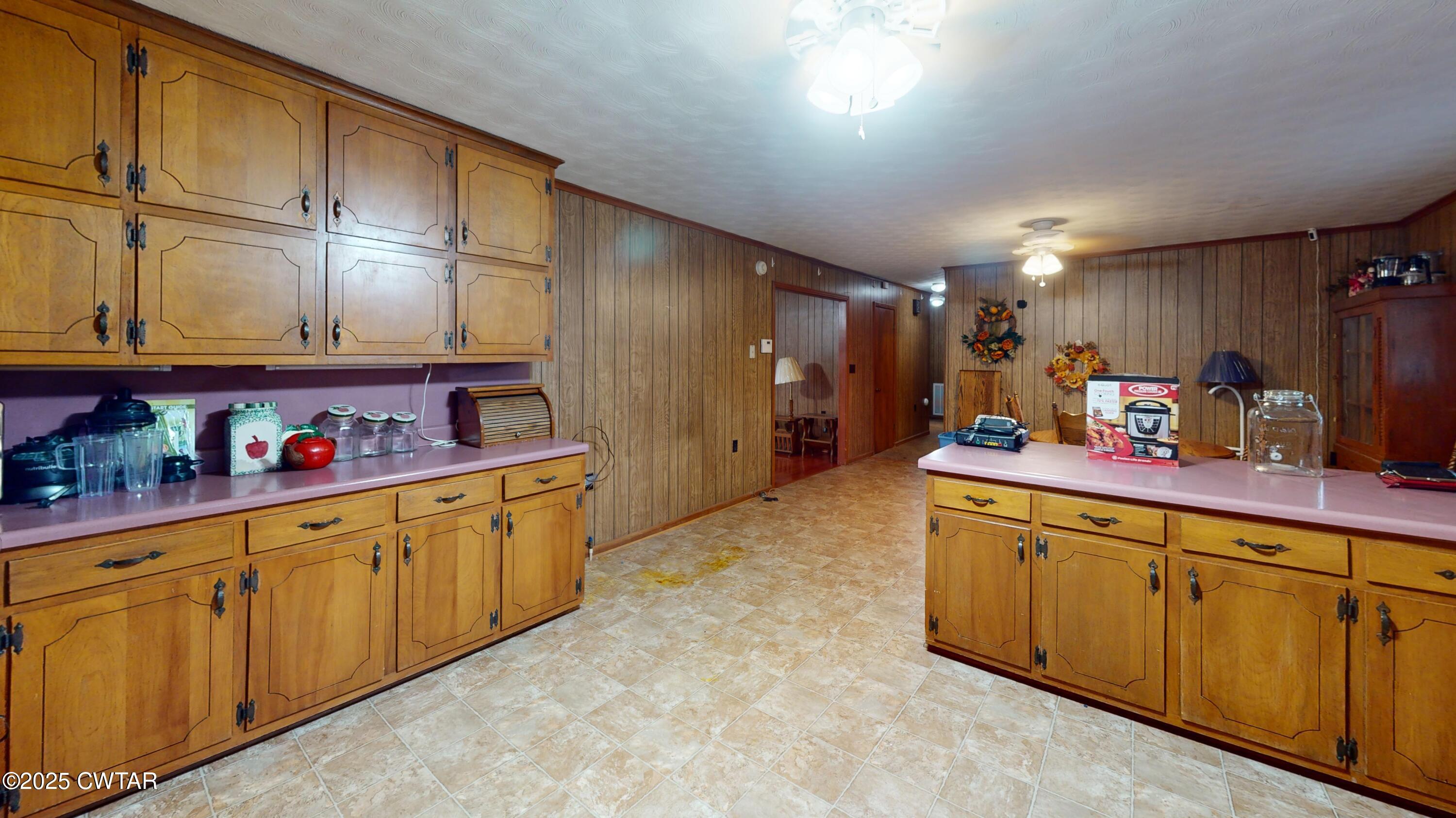 65 Lightfoot Luckett Road Ripley, TN 38063 - Photo 11 of 30 a kitchen with cabinets a sink and appliances