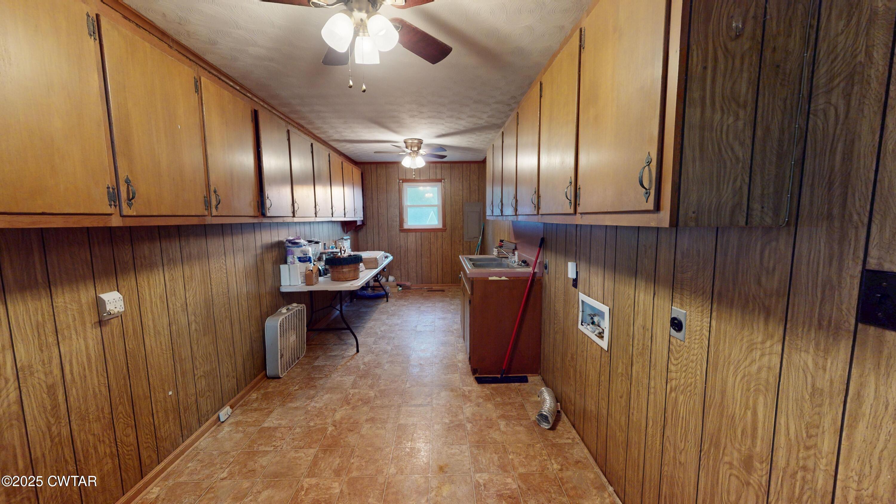 65 Lightfoot Luckett Road Ripley, TN 38063 - Photo 12 of 30 a kitchen with granite countertop lots of wooden cabinets