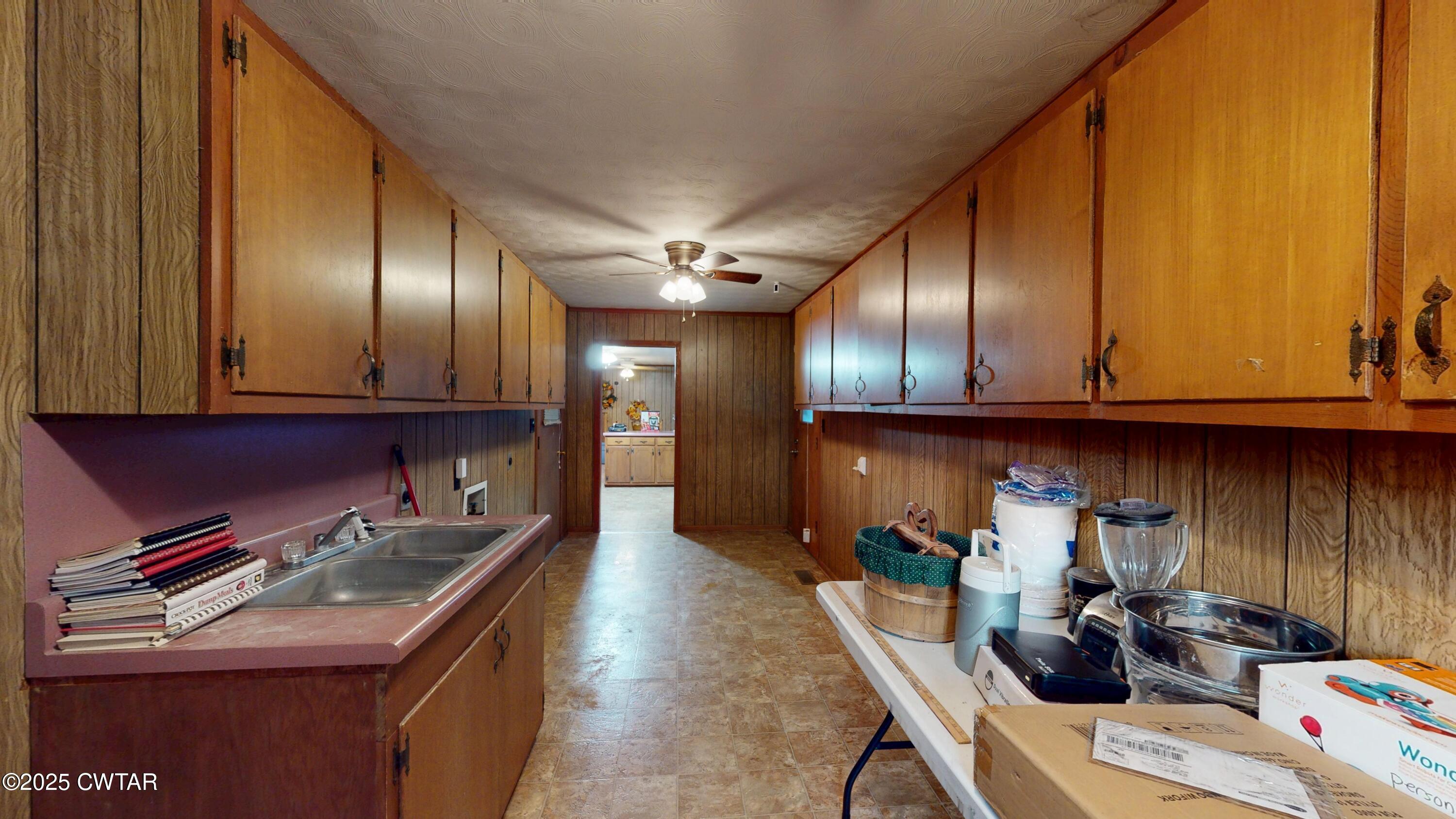 65 Lightfoot Luckett Road Ripley, TN 38063 - Photo 13 of 30 a kitchen with a sink cabinets and appliances