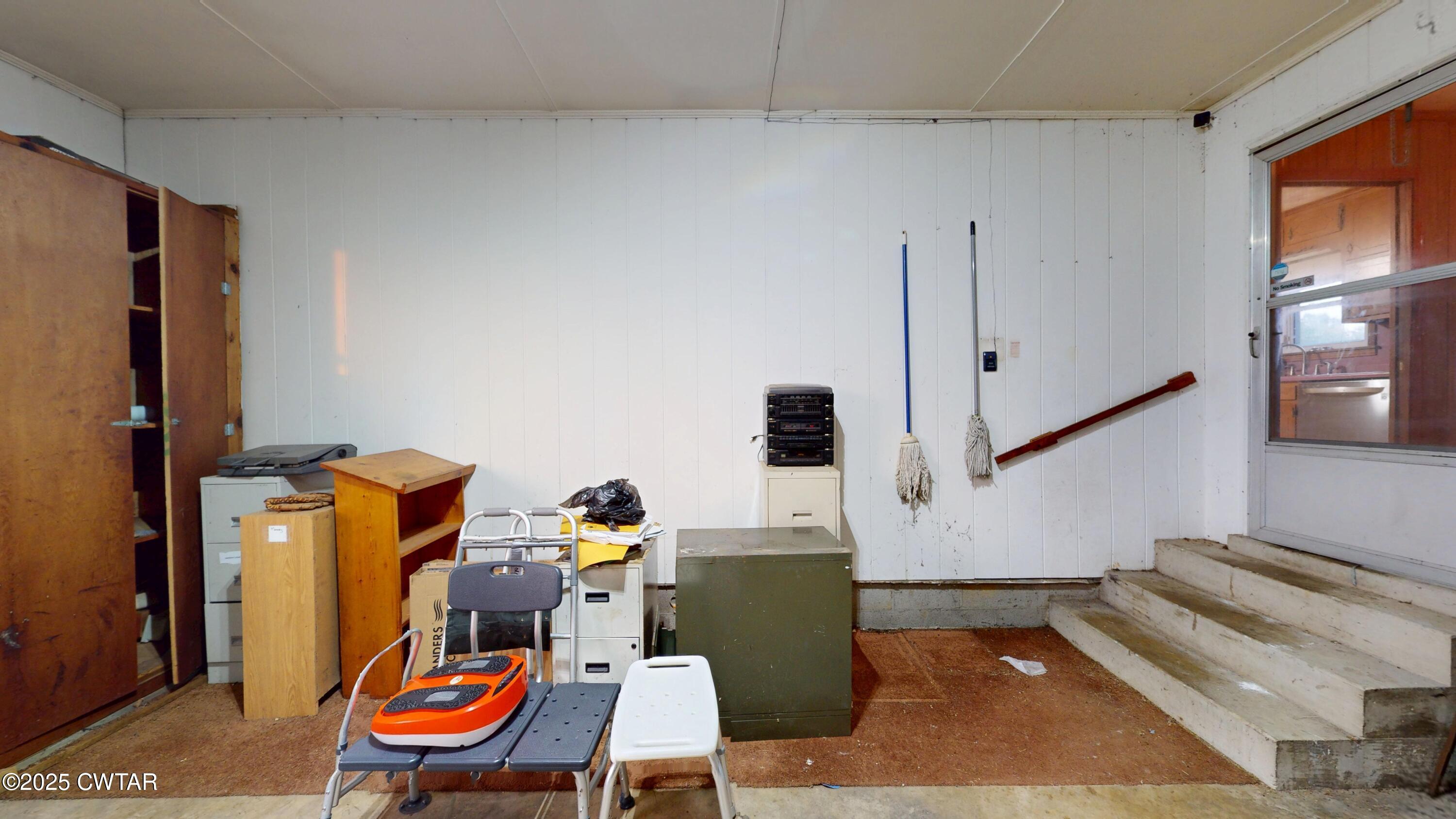 65 Lightfoot Luckett Road Ripley, TN 38063 - Photo 14 of 30 a room with furniture and a painting on the wall