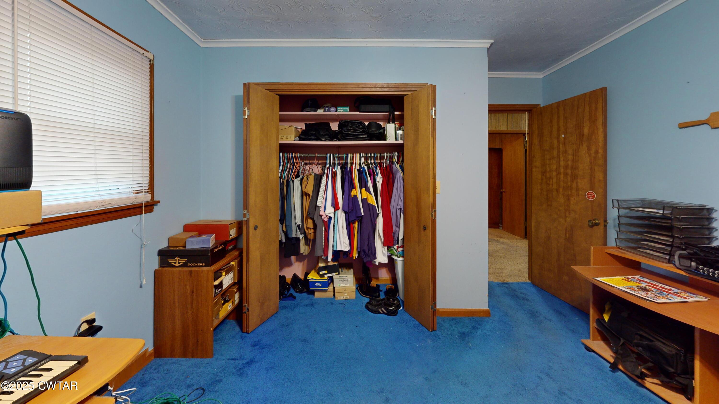 65 Lightfoot Luckett Road Ripley, TN 38063 - Photo 22 of 30 a view of walk in closet with clothes and shoes