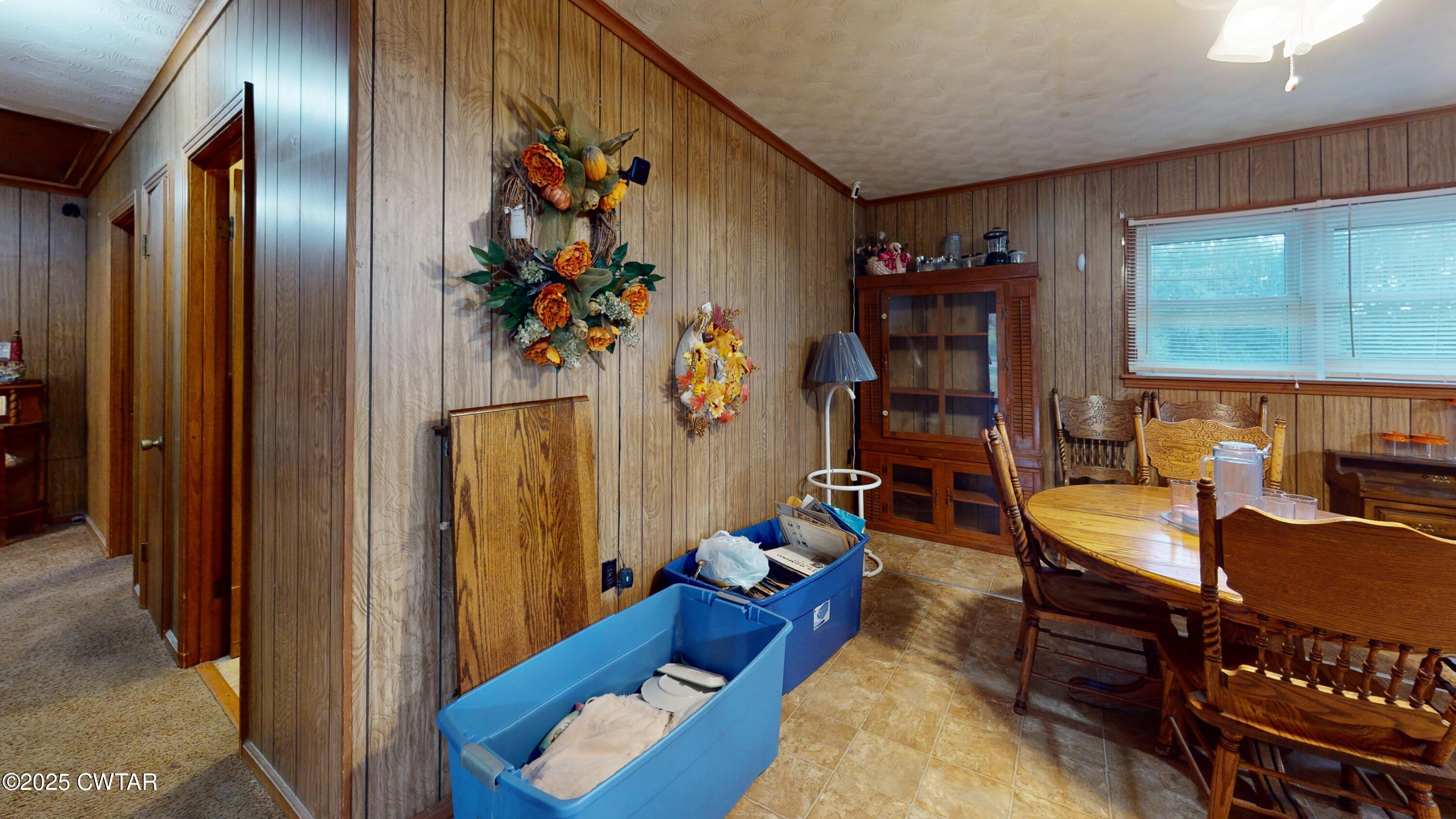 65 Lightfoot Luckett Road Ripley, TN 38063 - Photo 8 of 30 a living room with furniture stairs and a window