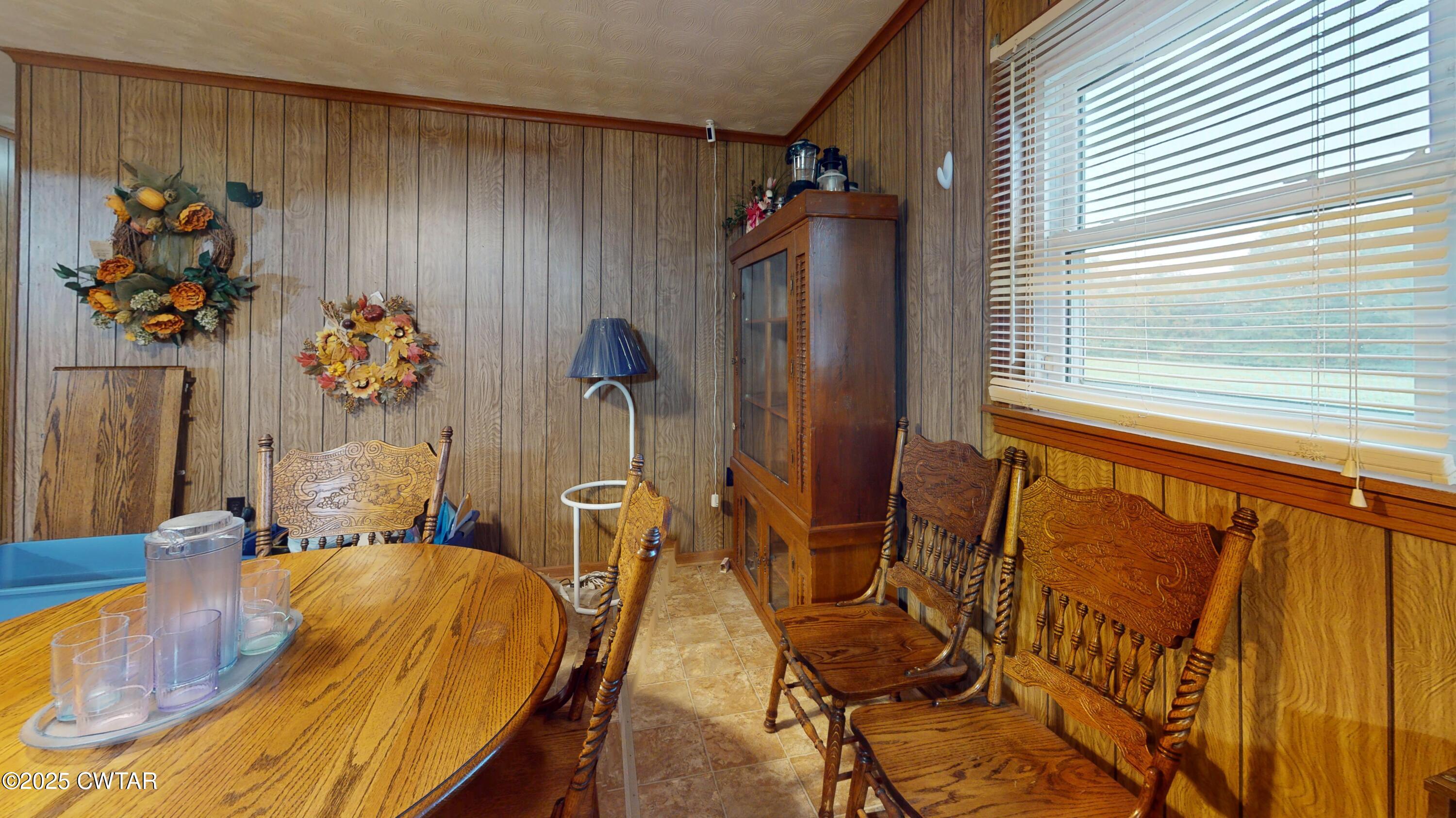 65 Lightfoot Luckett Road Ripley, TN 38063 - Photo 10 of 30 a bed sitting in a bedroom next to a window