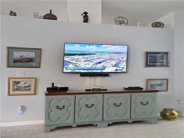 a view of cabinets with wooden floor