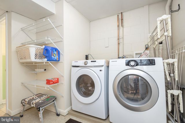 a view of a patio with a yard