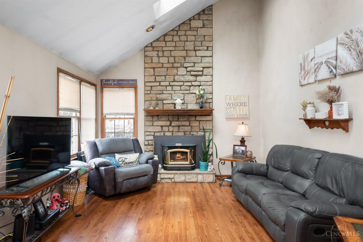 6361 Sharps Ridge Court Hamilton, OH 45011 - Photo 12 of 32 You will truly enjoy this family room with floor to ceiling stone fireplace, vaulted ceilings and skylite. The Buck Stone brand heat exchanger will keep you warm even in the coldest weather.