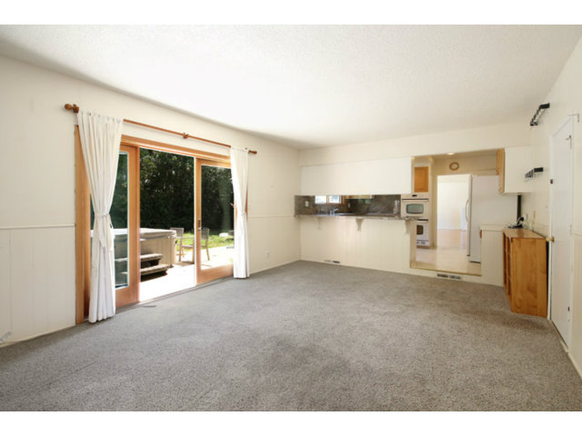 209 Segre Place Santa Cruz, CA 95060 - Photo 5 of 24 a view of a big room with closet and windows