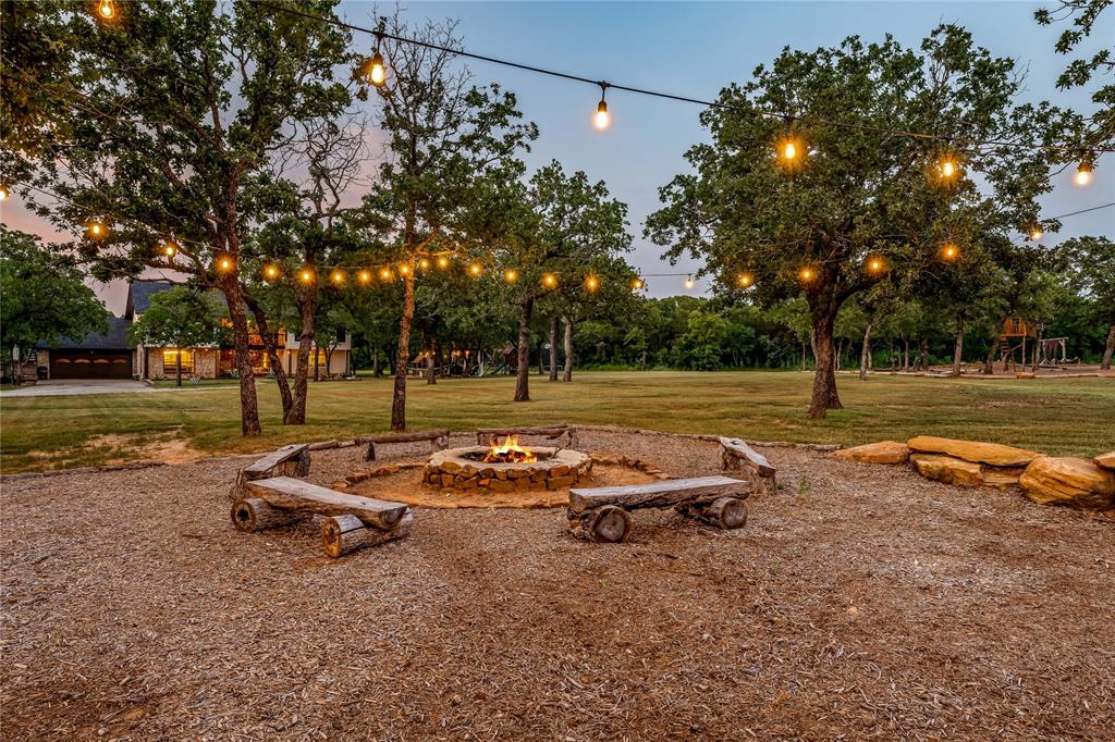 3113 Rock Creek Road Mineral Wells, TX 76067 - Photo 11 of 37 a view of a park with large trees