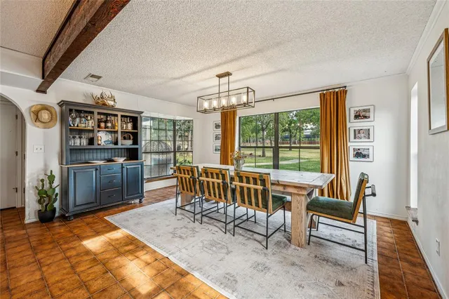 a view of a park with swings and slides