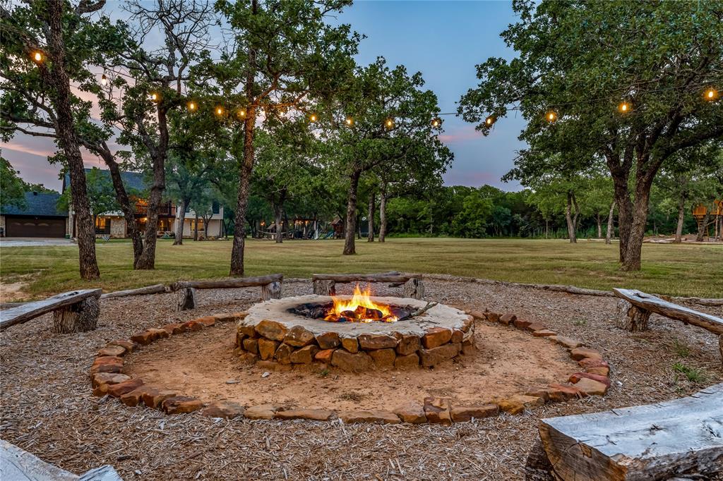 3113 Rock Creek Road Mineral Wells, TX 76067 - Photo 23 of 37 a view of a park with large trees