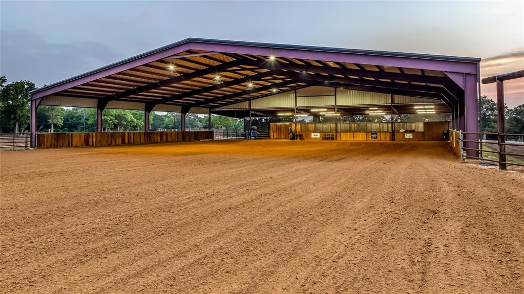 3113 Rock Creek Road Mineral Wells, TX 76067 - Photo 9 of 37 a view of swimming pool with table and chairs under an umbrella