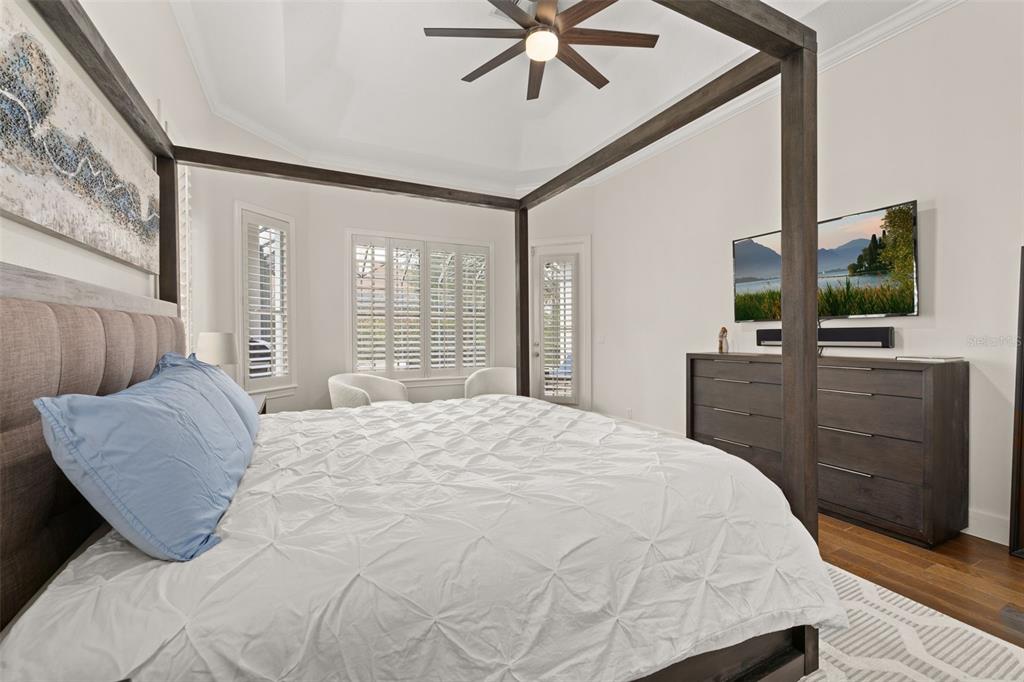 8351 Bowden Way Windermere, FL 34786 - Photo 22 of 71 a bedroom with a large bed and flat screen tv