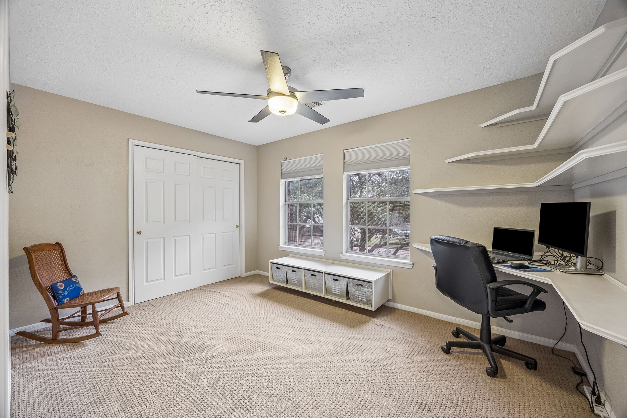 2030 Gemini Street Houston, TX 77058 - Photo 20 of 25 a view of a livingroom with workspace and a window