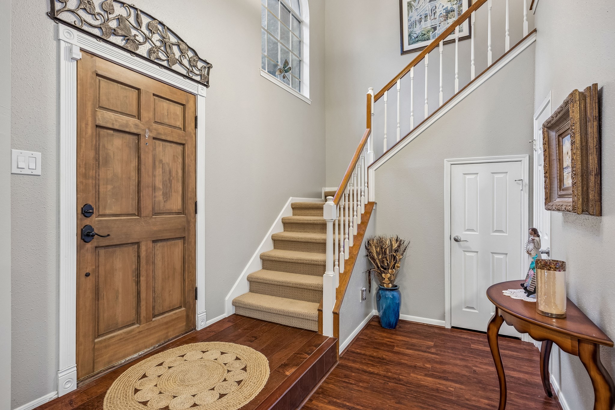 2030 Gemini Street Houston, TX 77058 - Photo 2 of 25 a view of entryway with wooden floor and stairs