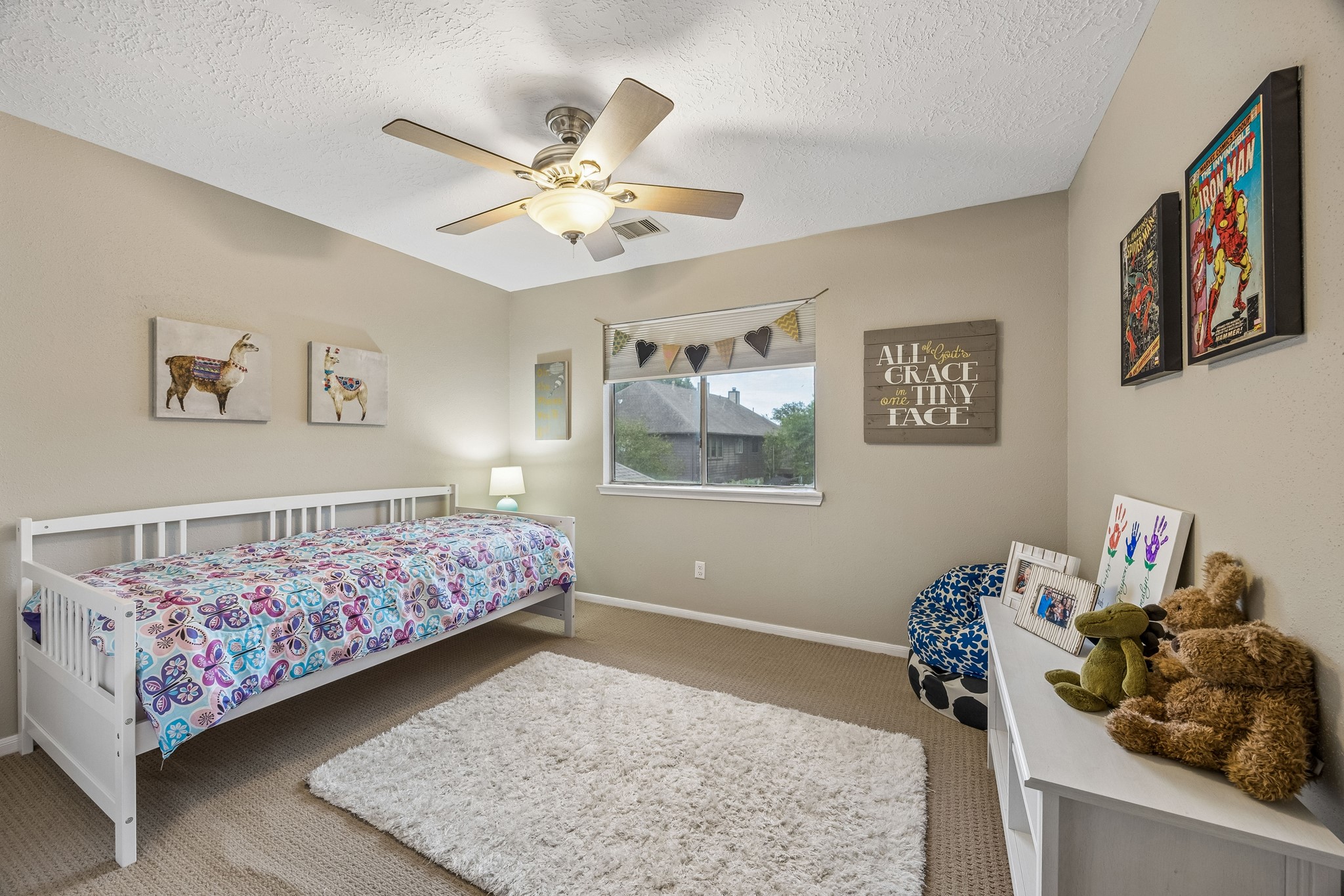 2030 Gemini Street Houston, TX 77058 - Photo 21 of 25 a bedroom with a bed and window