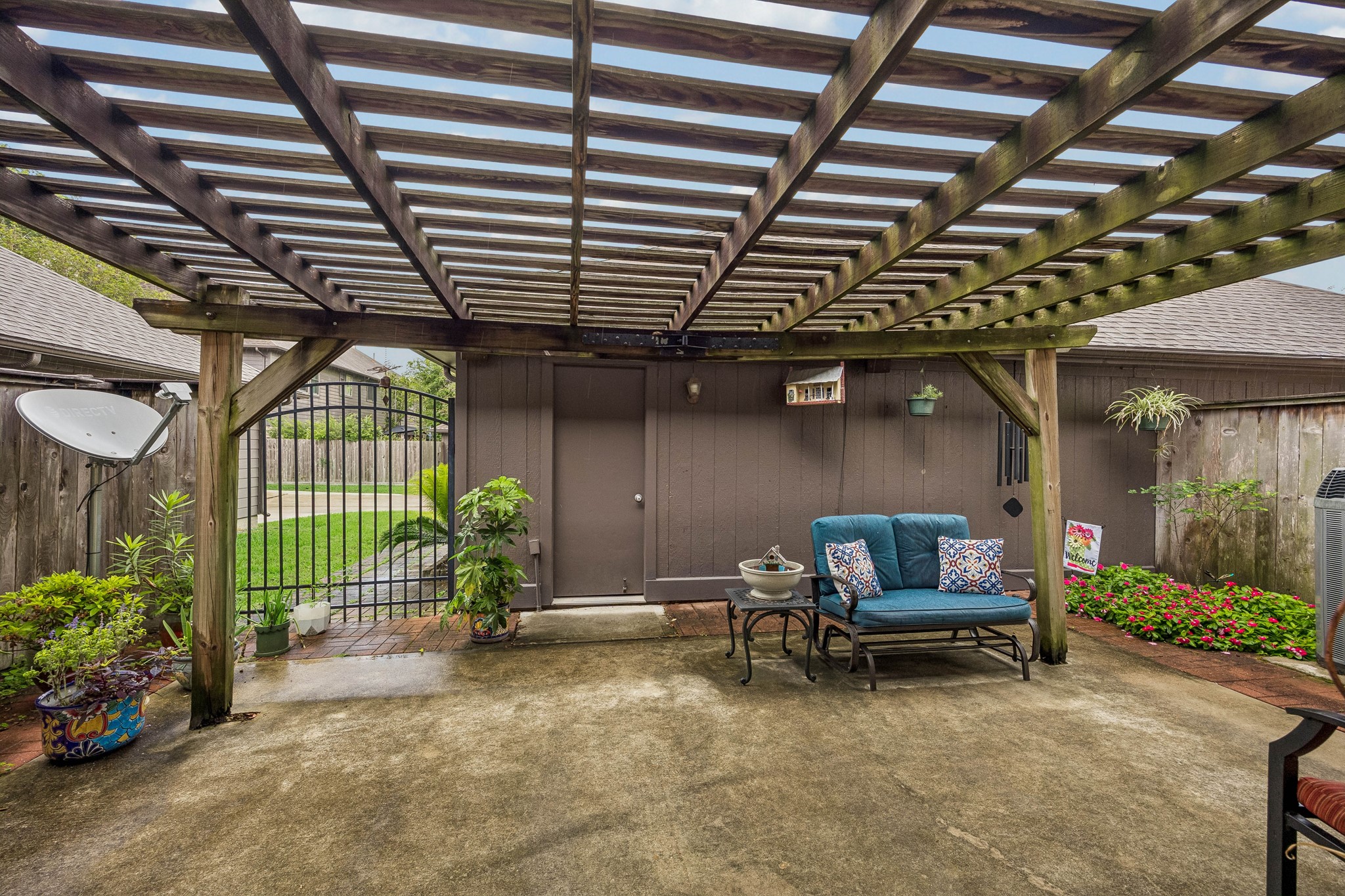 2030 Gemini Street Houston, TX 77058 - Photo 23 of 25 a view of a chairs and table in backyard