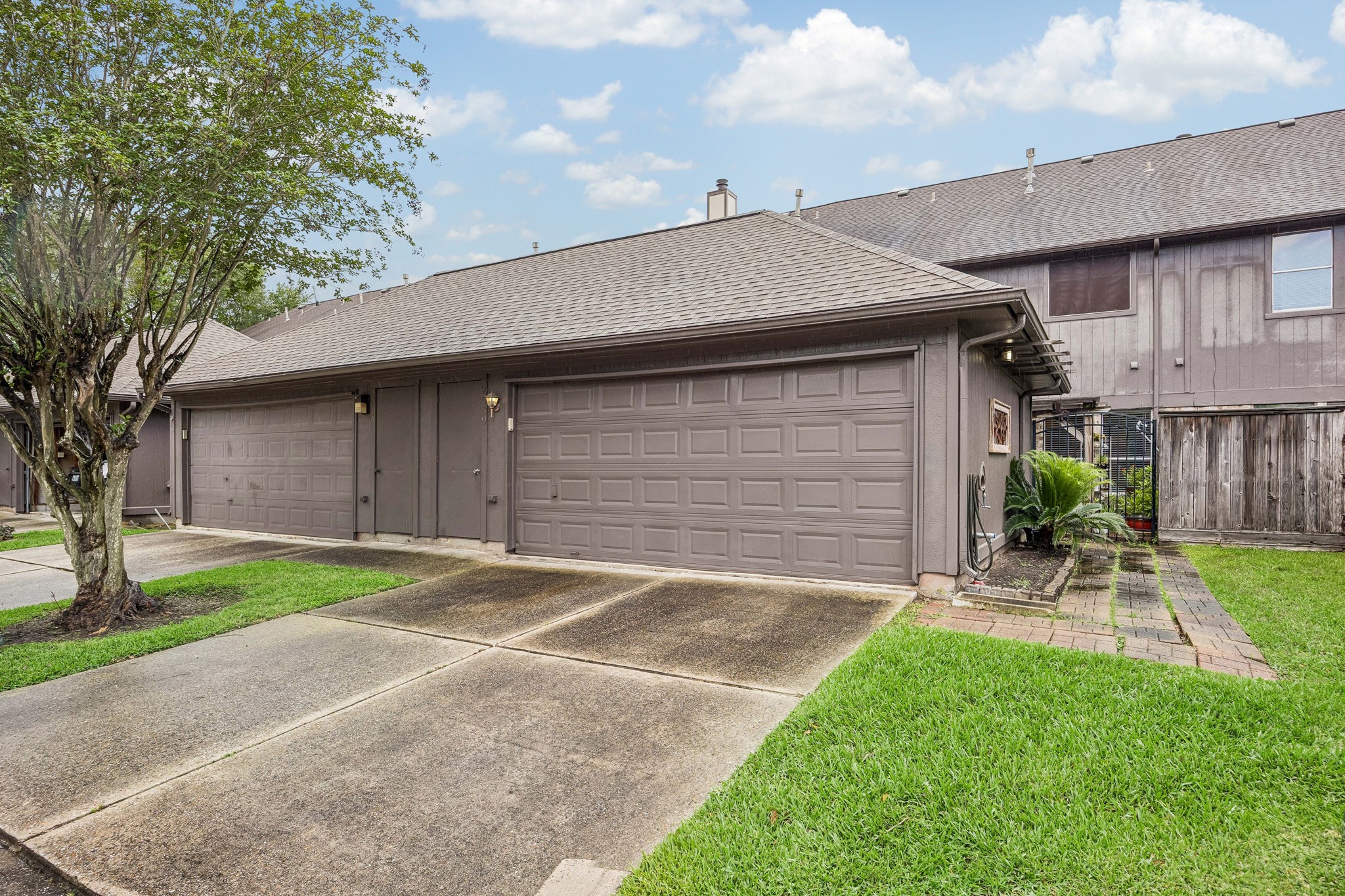 2030 Gemini Street Houston, TX 77058 - Photo 24 of 25 a backyard of a house with table and chairs
