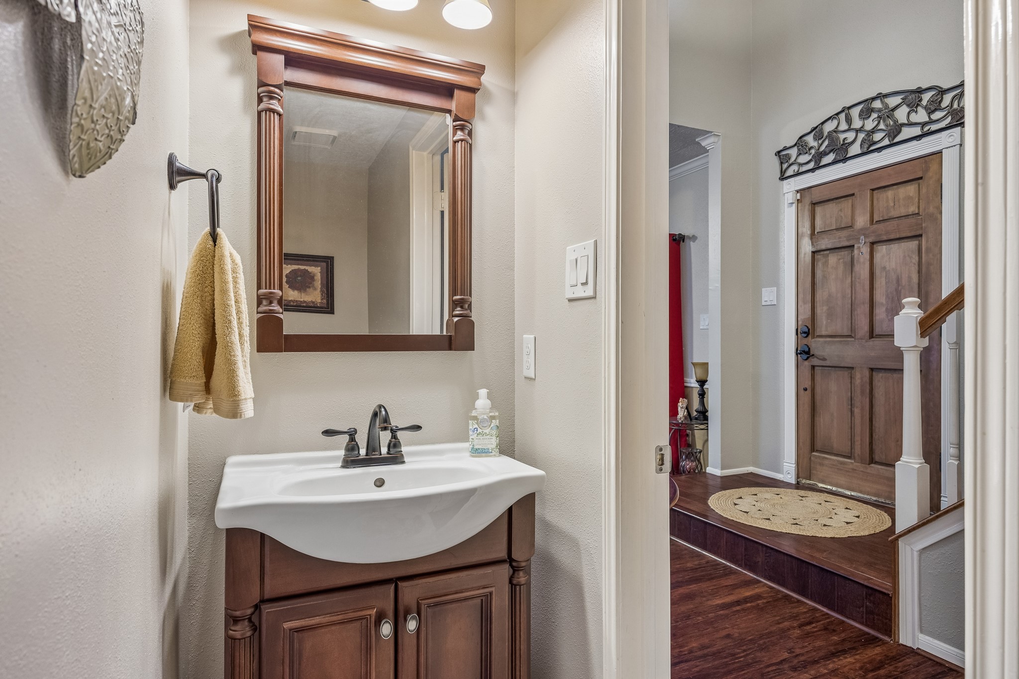 2030 Gemini Street Houston, TX 77058 - Photo 3 of 25 a bathroom with a sink and a mirror