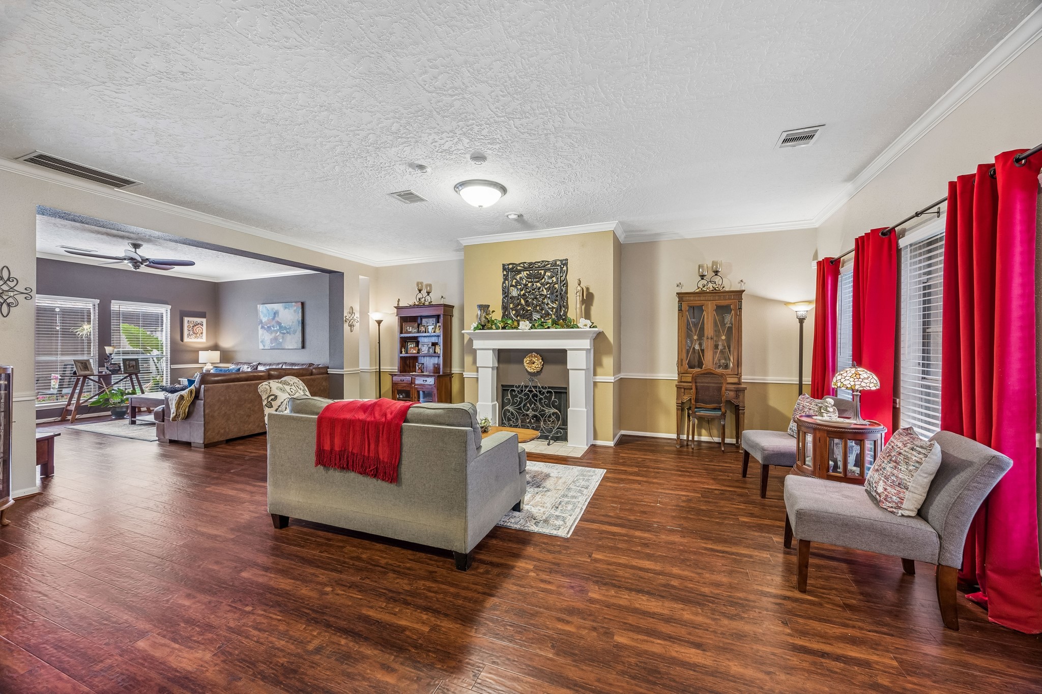 2030 Gemini Street Houston, TX 77058 - Photo 5 of 25 a living room with furniture fireplace and flat screen tv