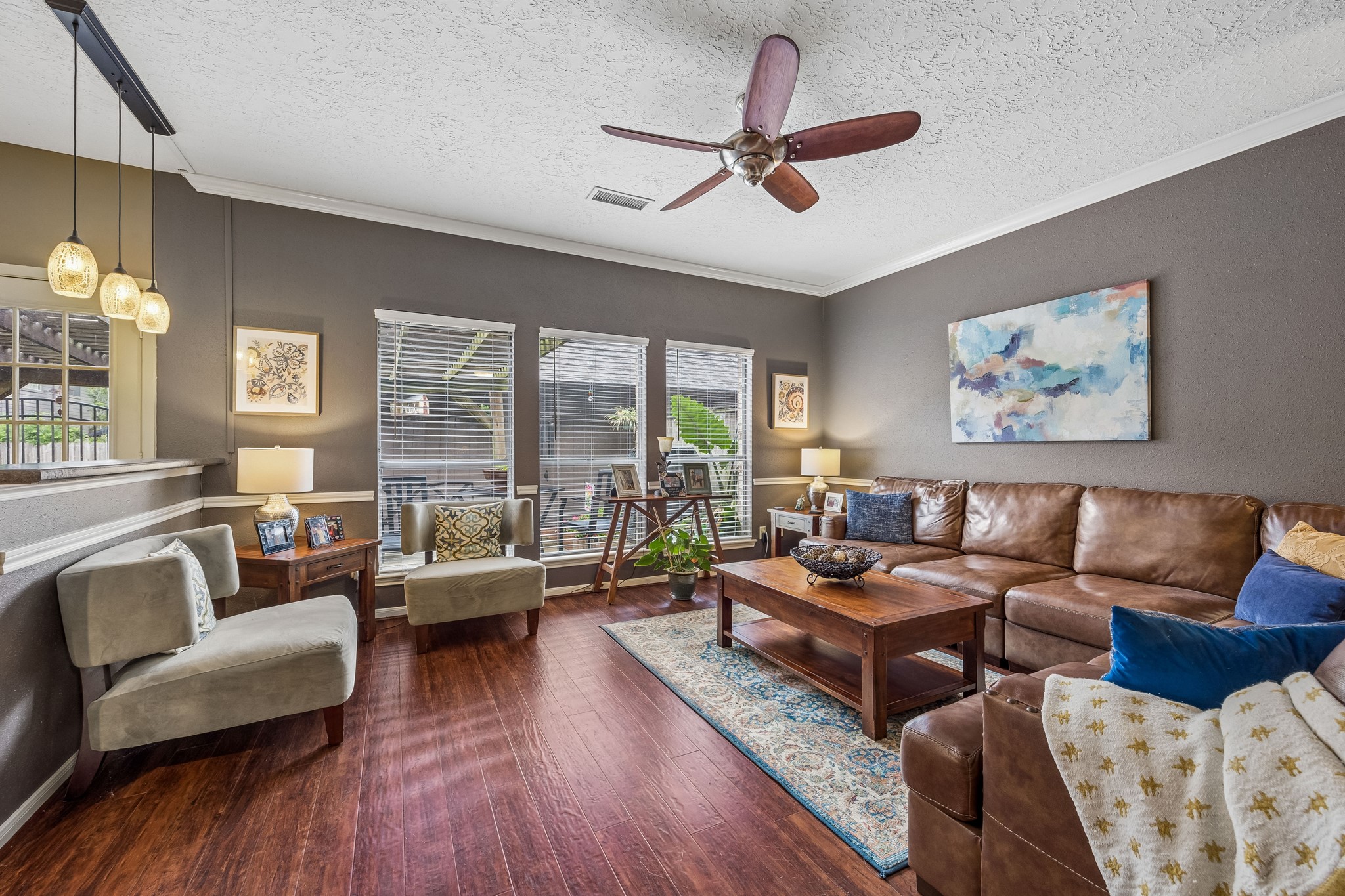 2030 Gemini Street Houston, TX 77058 - Photo 7 of 25 a living room with furniture and a large window