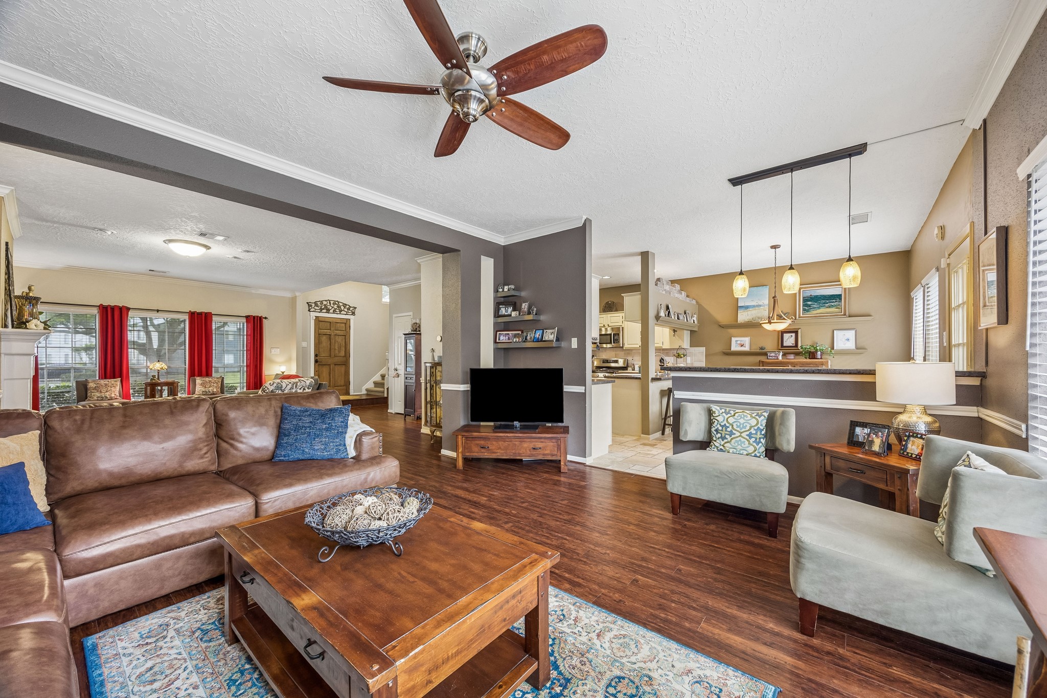 2030 Gemini Street Houston, TX 77058 - Photo 8 of 25 a living room with furniture and a fireplace