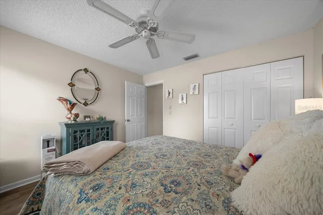 a view of a dining room with furniture wooden floor and chandelier