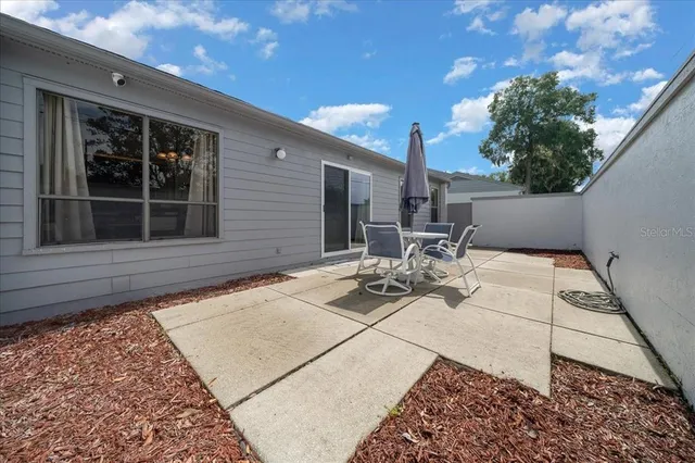 a backyard of a house with lots of green space