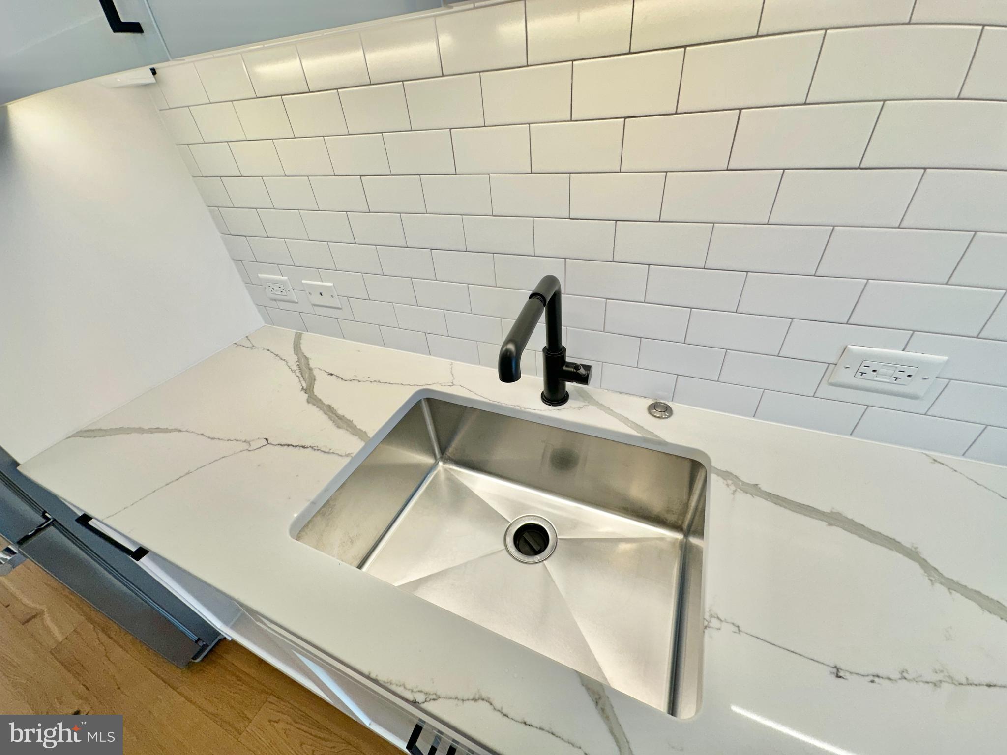 1211 Van Street Southeast, Unit 1201 Washington, DC 20003 - Photo 13 of 60 a bathroom with a sink