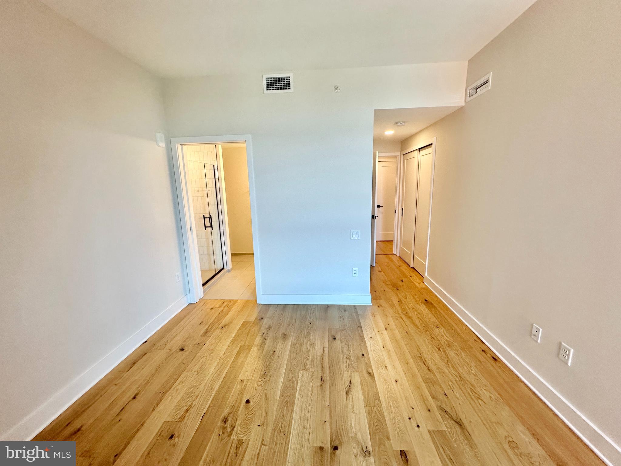 1211 Van Street Southeast, Unit 1201 Washington, DC 20003 - Photo 20 of 60 a view of hallway with wooden floor