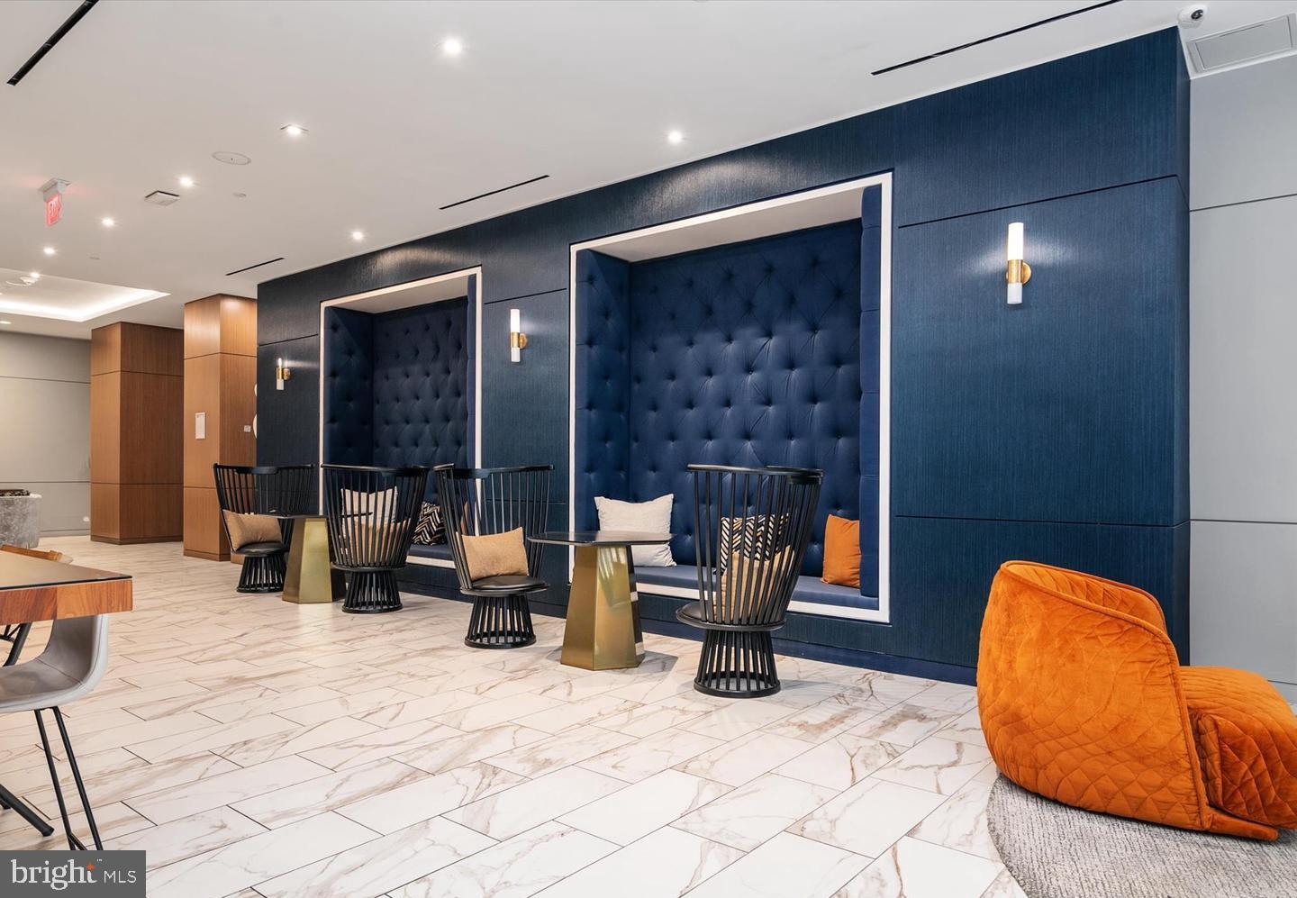 1211 Van Street Southeast, Unit 1201 Washington, DC 20003 - Photo 44 of 60 a view of a patio with a dining table and chairs