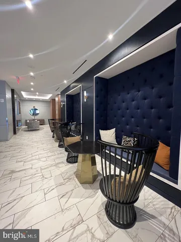 a room with gym equipment and large window