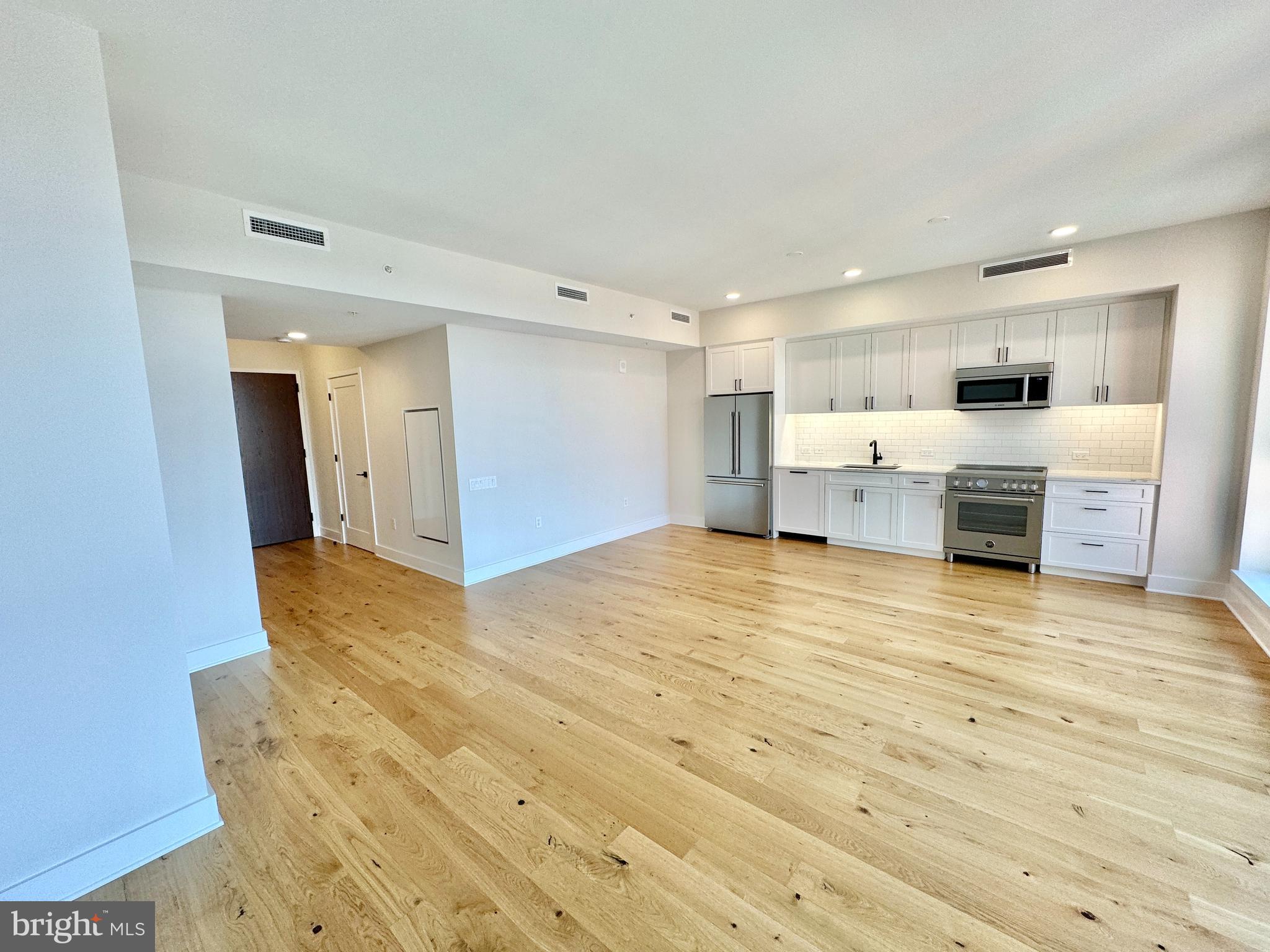 1211 Van Street Southeast, Unit 1201 Washington, DC 20003 - Photo 10 of 60 a view of kitchen and wooden floor