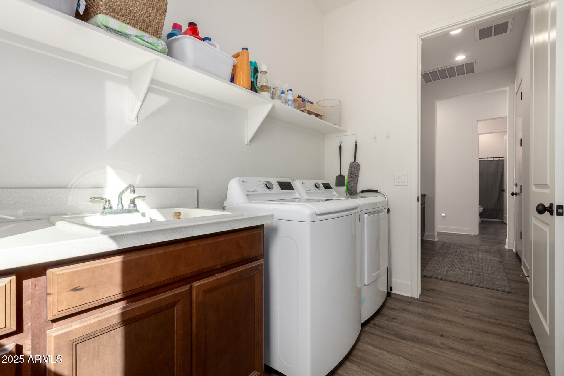 22724 East Poco Calle Queen Creek, AZ 85142 - Photo 39 of 55 Large Fully Stocked Laundry