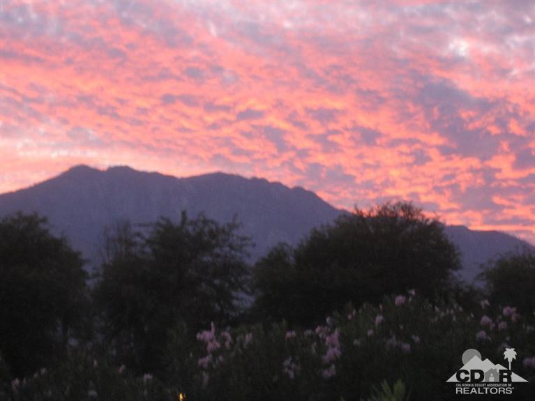 72694 Eagle Road, Unit 3 Palm Desert, CA 92260 - Photo 35 of 35 a view of a house with a street