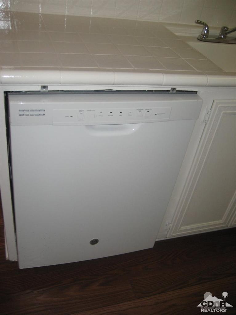 72694 Eagle Road, Unit 3 Palm Desert, CA 92260 - Photo 9 of 35 a view of cupboard