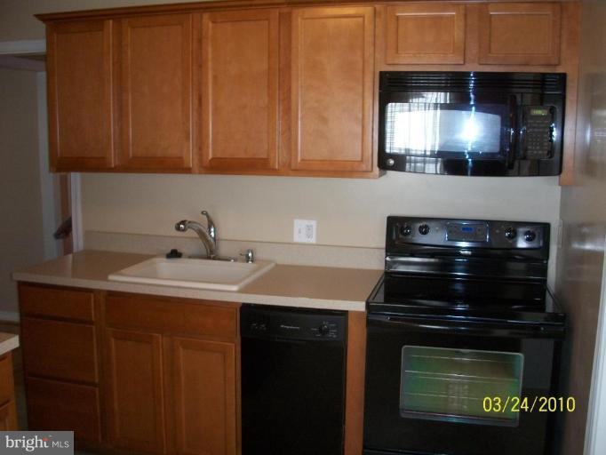 12106 Selfridge Road Silver Spring, MD 20906 - Photo 7 of 12 New kitchen cabinets & appliances!