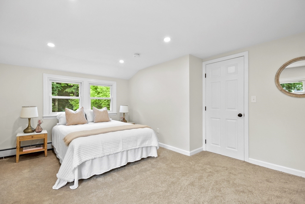 21 Woodside Road Billerica, MA 01862 - Photo 17 of 34 a bedroom with a bed and a window