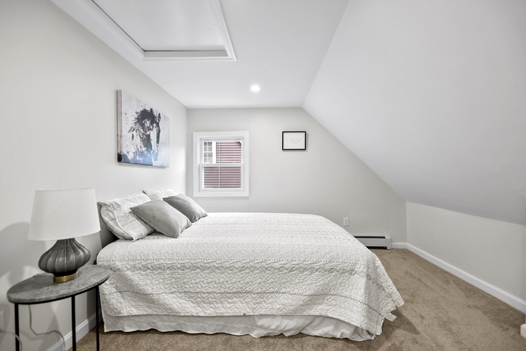 21 Woodside Road Billerica, MA 01862 - Photo 19 of 34 a bedroom with a bed and furniture