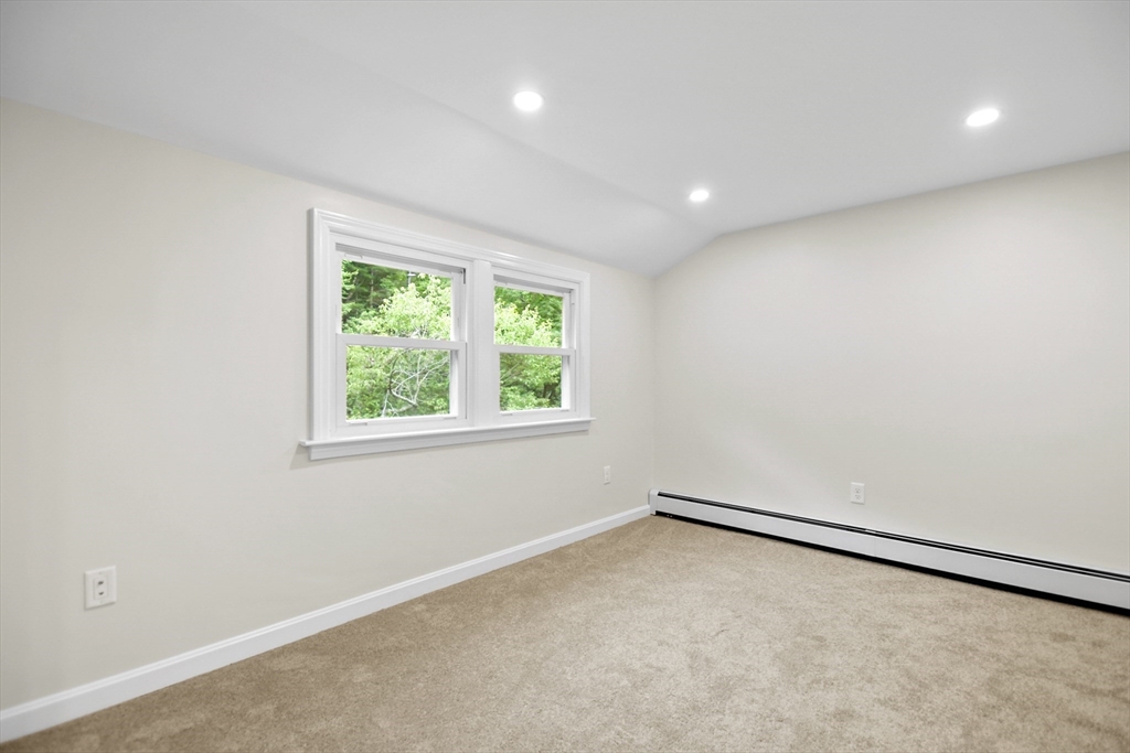 21 Woodside Road Billerica, MA 01862 - Photo 20 of 34 an empty room with a window